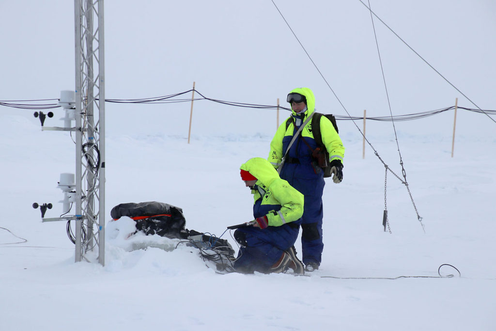 Ian Brooks Checking data logger with Nicke Jusso