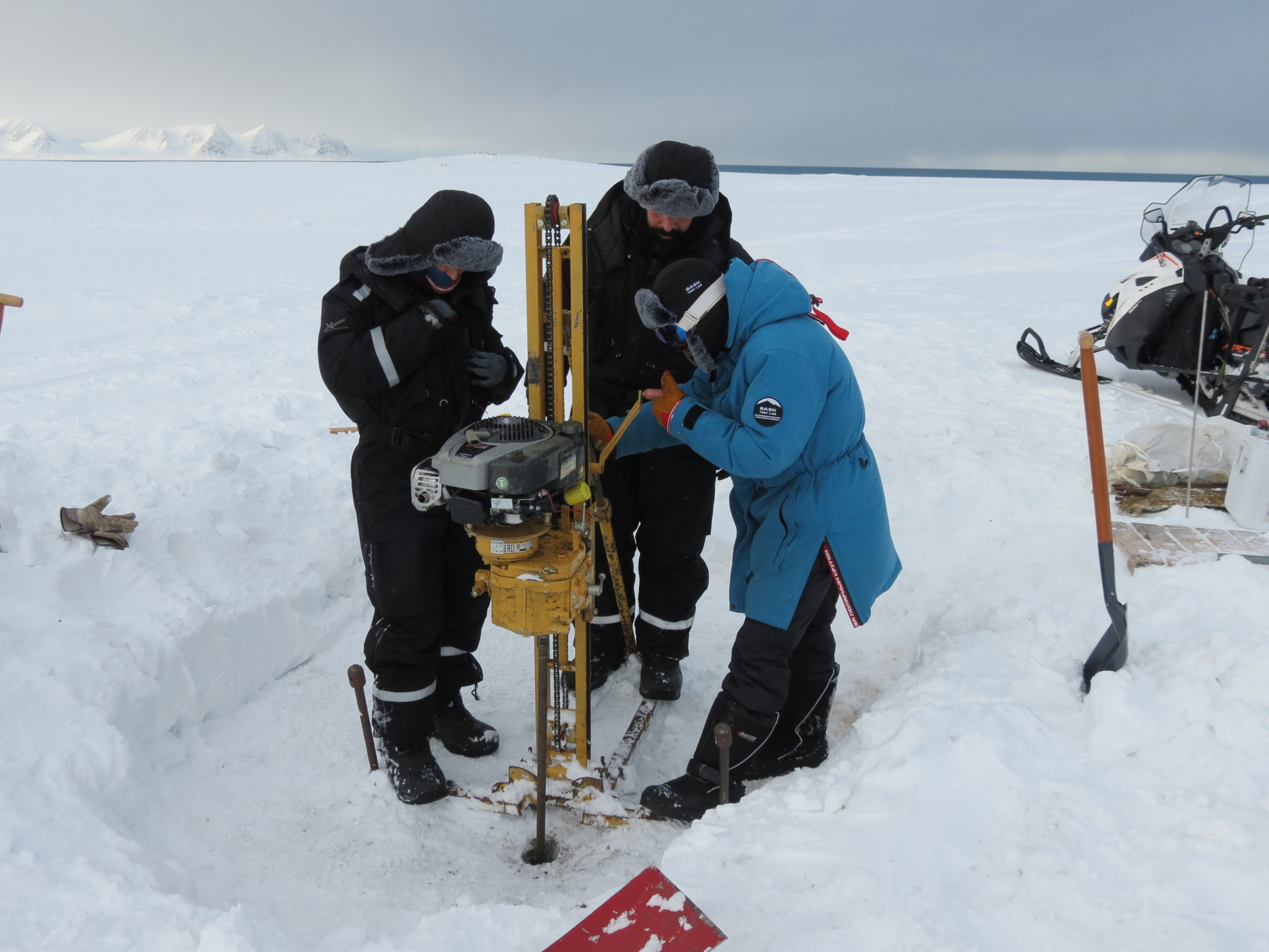 Karen Lloyd, Donato Giovannelli, and Andrey Abramov drilling permafrost